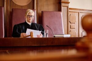 Judge presiding over a courtroom during a criminal trial, illustrating legal guidance from a San Diego criminal defense attorney.