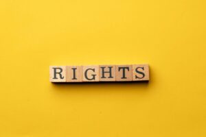 Wooden letter blocks spelling rights, representing Miranda rights explained by an Orange County criminal defense attorney.