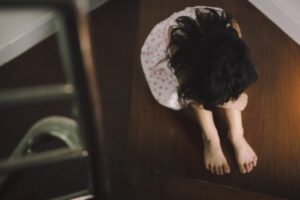 Child abuse awareness concept illustrating California child abuse laws explained by a Carlsbad criminal defense lawyer.