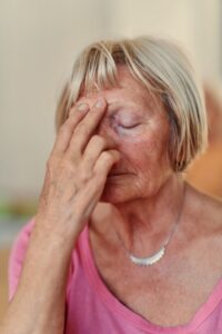 Elderly woman appearing distressed to illustrate an elder abuse case explained by a Chula Vista criminal defense attorney.