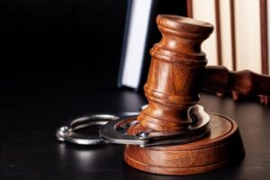 Judge's gavel resting on a desk representing California penal codes explained by an Escondido criminal defense attorney.