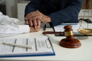 Carlsbad criminal defense lawyer consulting with a client about early legal representation in a criminal case